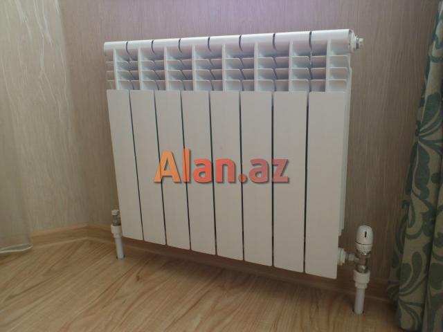 Kombi sisteminin cekilmesi,qurasdirilmasi,isti polun cekilmesi,santexnik isleri