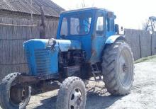 Traktor mtz 52  üstündə kotan mala və kasılka verilir