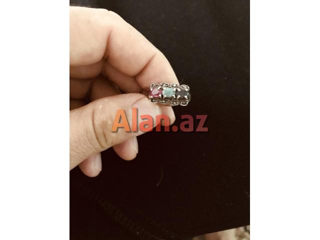 Qadin ucun gumus uzuk