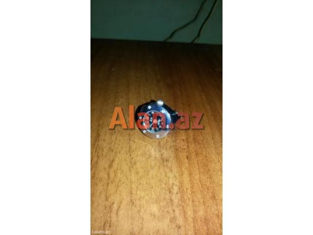 Barmağa taxılan üzük formalı saat