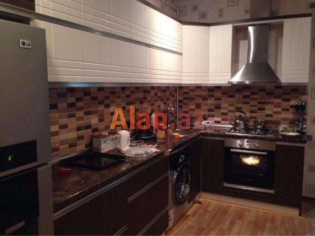 8km bazari, 251 nomreli litsey-mektebin yanindaki yeni tikilide 90м² 2 otag super temirli menzil