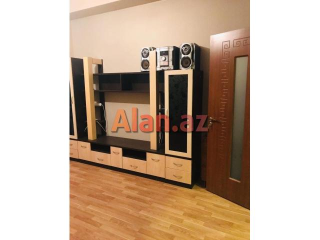 8km bazari, 251 nomreli litsey-mektebin yanindaki yeni tikilide 90м² 2 otag super temirli menzil