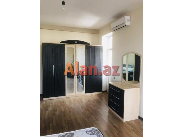 8km bazari, 251 nomreli litsey-mektebin yanindaki yeni tikilide 90м² 2 otag super temirli menzil