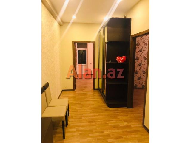 8km bazari, 251 nomreli litsey-mektebin yanindaki yeni tikilide 90м² 2 otag super temirli menzil