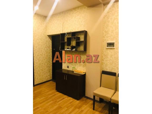 8km bazari, 251 nomreli litsey-mektebin yanindaki yeni tikilide 90м² 2 otag super temirli menzil