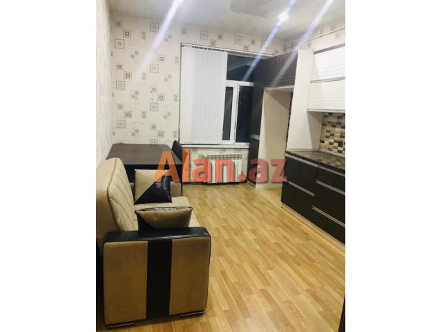 8km bazari, 251 nomreli litsey-mektebin yanindaki yeni tikilide 90м² 2 otag super temirli menzil