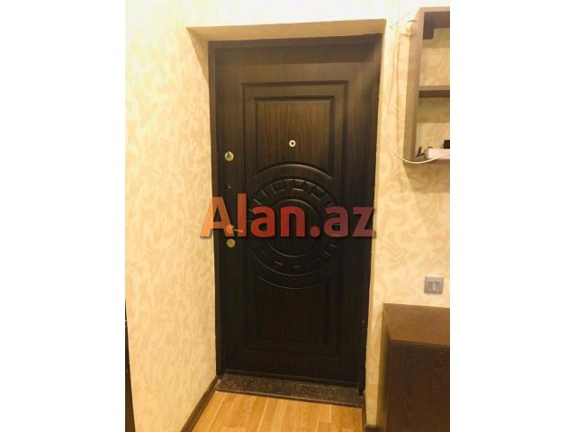 8km bazari, 251 nomreli litsey-mektebin yanindaki yeni tikilide 90м² 2 otag super temirli menzil