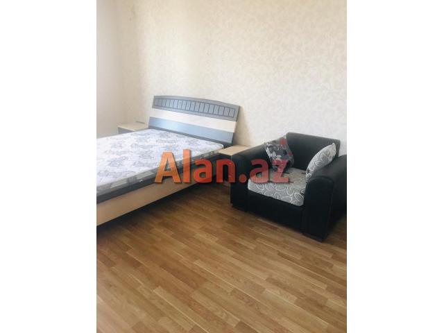 8km bazari, 251 nomreli litsey-mektebin yanindaki yeni tikilide 90м² 2 otag super temirli menzil