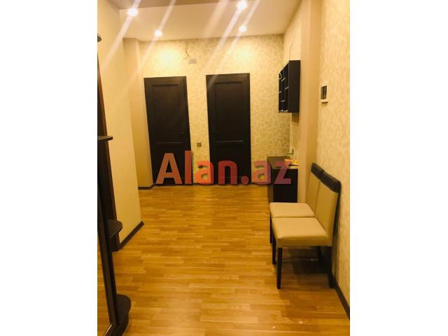 8km bazari, 251 nomreli litsey-mektebin yanindaki yeni tikilide 90м² 2 otag super temirli menzil