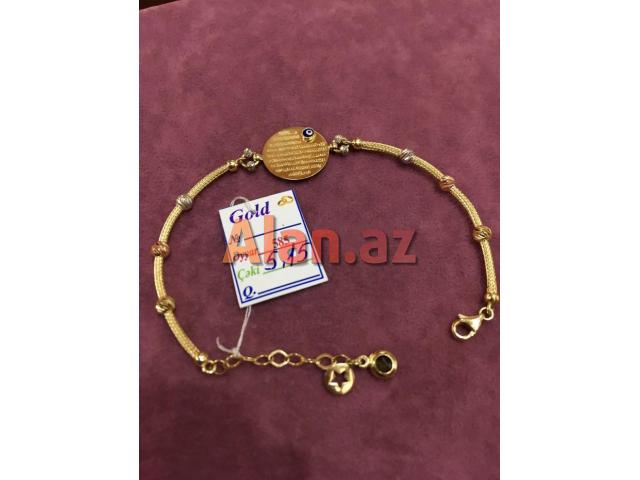 Qizil 585 prob qolbaq pandora  modeldir. Klon uzerinde ayetel kursi qeyd olunub.