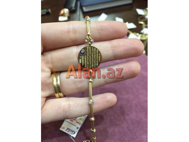 Qizil 585 prob qolbaq pandora  modeldir. Klon uzerinde ayetel kursi qeyd olunub.