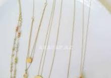 Qadınlar üçün qızıl əşyalar