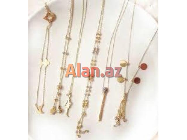 Qadınlar üçün qızıl əşyalar