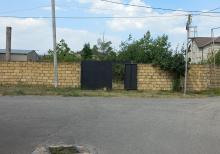 Qubada həyətyanı torpaq sahəsi satılır