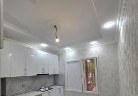 Qaracuxur qes. Celal Qurbanov kucesi Yeni Temir 2 otaqlı Menzil satılır.