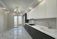 Xalqlar Dostlugu Metro yanı  Yeni Temir 4 otaqlı Menzil satılır.