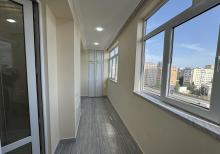 Xalqlar Dostlugu Metro yanı  Yeni Temir 4 otaqlı Menzil satılır.