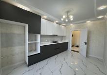 Xalqlar Dostlugu Metro yanı  Yeni Temir 4 otaqlı Menzil satılır.