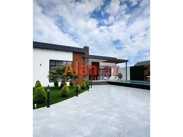 Merdekan qesebesi. Muasir Uslubda İnsaa edilmis Bag Evi satılır.