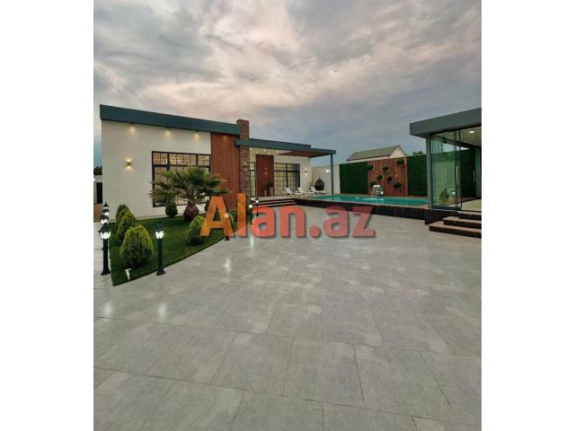 Merdekan qesebesi. Muasir Uslubda İnsaa edilmis Bag Evi satılır.