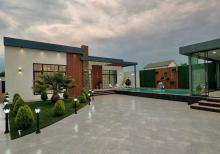 Merdekan qesebesi. Muasir Uslubda İnsaa edilmis Bag Evi satılır.