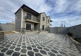 Zığ qesebesi.  Muasir dizaynla İnsaa edilmis  4 otaqlı Heyet evi  satılır.