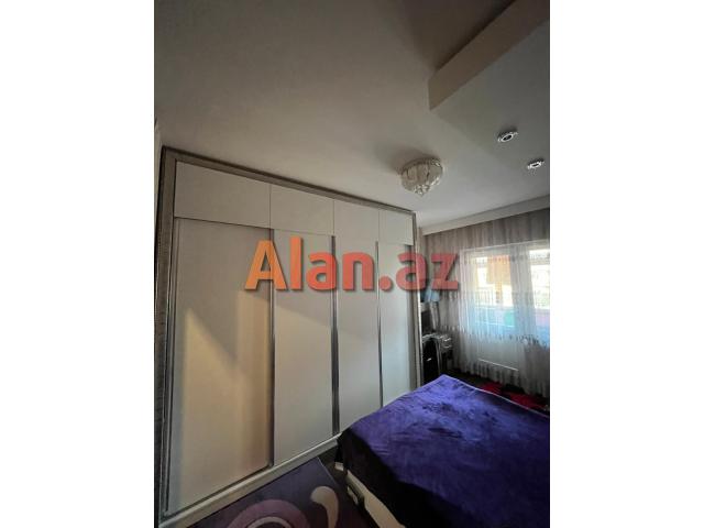 Yeni Günəşli, V Massivində 2 otaqlı əla təmirli mənzil