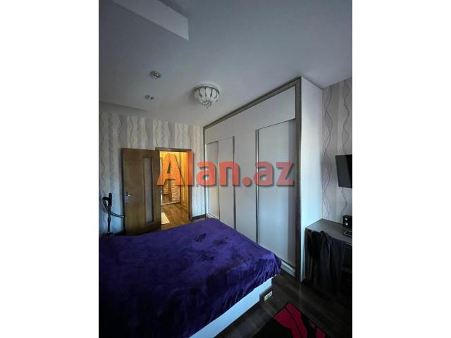 Yeni Günəşli, V Massivində 2 otaqlı əla təmirli mənzil