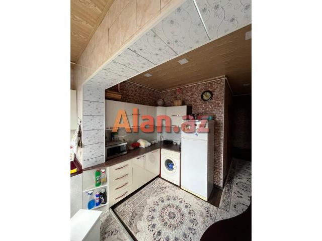 Yeni Günəşli, V Massivində 2 otaqlı əla təmirli mənzil