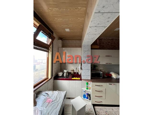 Yeni Günəşli, V Massivində 2 otaqlı əla təmirli mənzil