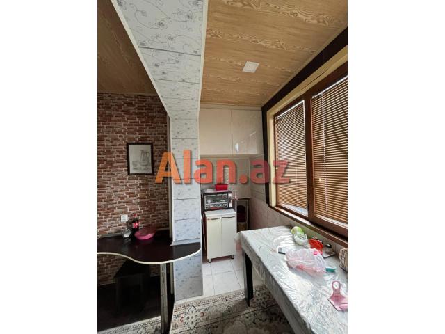 Yeni Günəşli, V Massivində 2 otaqlı əla təmirli mənzil