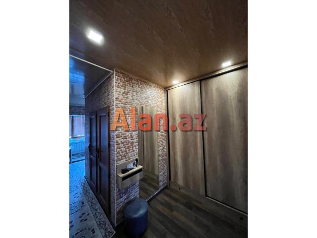 Yeni Günəşli, V Massivində 2 otaqlı əla təmirli mənzil