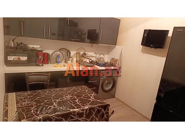 Razində 3 otaqlı tam əşyalı əla mənzil