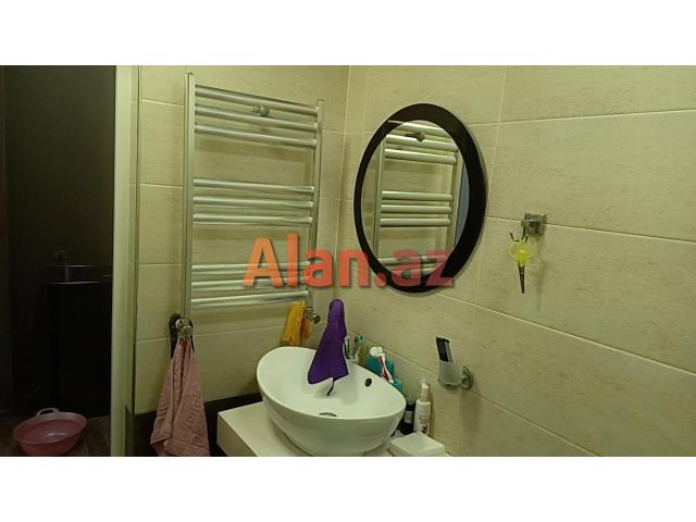 Razində 3 otaqlı tam əşyalı əla mənzil