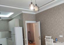 60 m2  2 otaqlı tam təmirli mənzil kirayə verilir