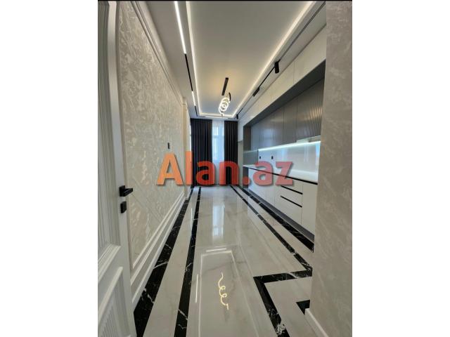 yeni yasamalda yeni təmirli mənzil satılır