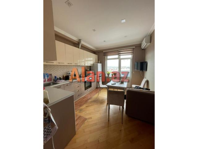 mikayil muwviq kucesinde ipotekaya yararli2 otaqli menzil satilir