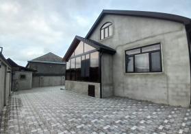 Qubanın Amsar kəndində tam əşyalı 6 sotun içində 4 otaqlı mənzil