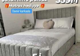 Taxt ikinəfərlik yataq