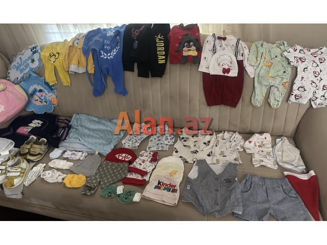 Uşaq kalyaskası vanna dəsti və uşaq paltarları
