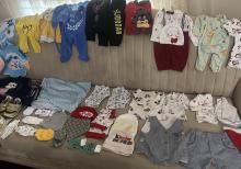 Uşaq kalyaskası vanna dəsti və uşaq paltarları